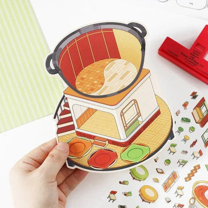 Hand holding colorful hotpot-themed miniature scene sticker set with furniture and decor pieces