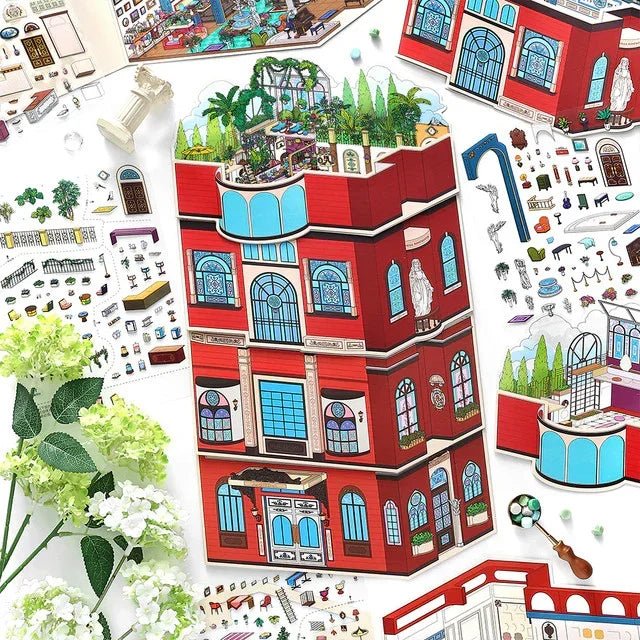 Miniature red building sticker set with detailed rooms, art salon, plants, and creative decor pieces.