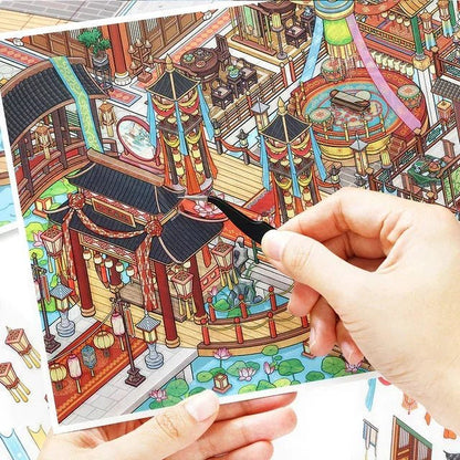 Hand placing a detailed Asian palace scene sticker, ideal for journaling or scrapbooking crafts.
