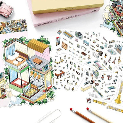 Colorful miniature house scene stickers and decorative journaling stickers on a white desk