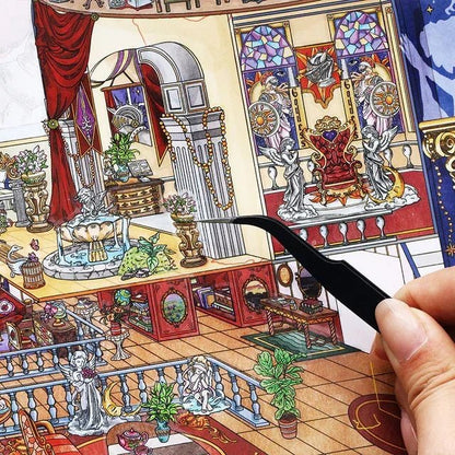 Hand placing a detailed oracle-themed scene sticker in a cozy, ornate miniature room setting.