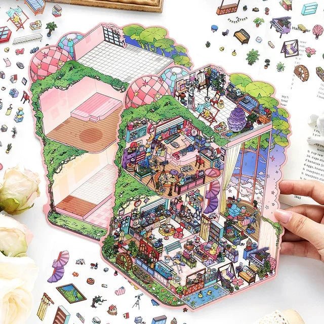 Hand holding colorful miniature house scene stickers with whimsical rooms for journaling crafts