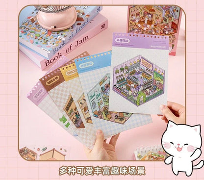 Hand holding colorful miniature scene stickers with cute town and shop illustrations for journaling
