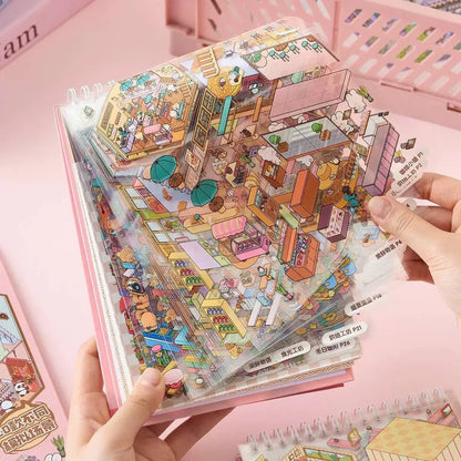 Colorful town scene stickers for journaling and scrapbooking, displayed in a pink album.