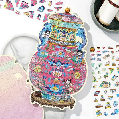 Colorful vintage vase sticker with floral patterns and cartoon figures, surrounded by craft stickers