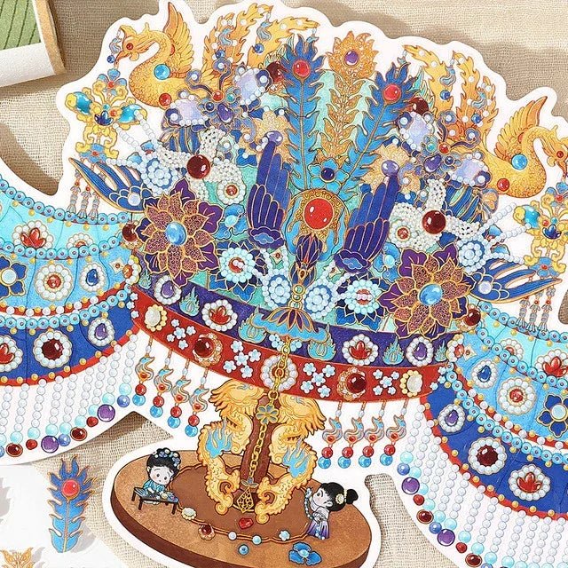 Vintage blue and gold phoenix crown sticker with intricate floral and gemstone details