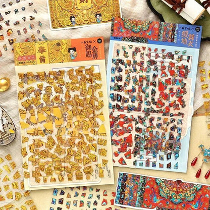 Ornate Asian vintage-themed scene stickers in gold and blue red, ideal for scrapbooking and journaling.