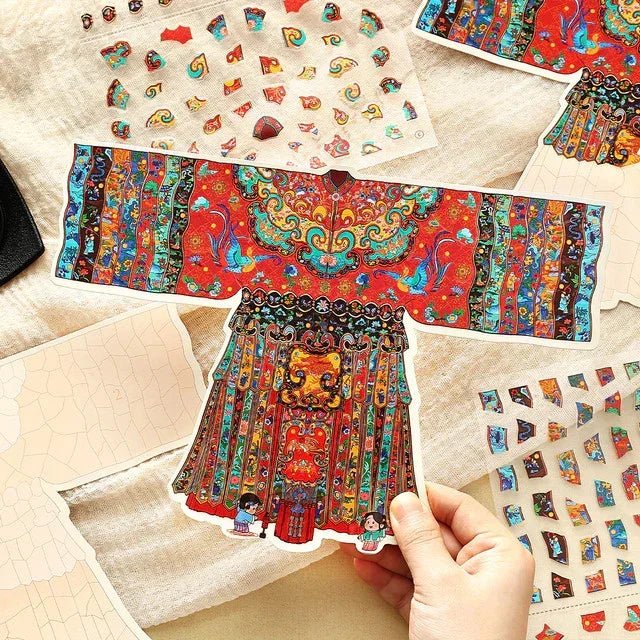Hand holding vintage-inspired imperial silk dance dress sticker with colorful ornate patterns