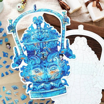 Blue vintage bronze vessel sticker with puzzle pieces for journaling and scrapbooking crafts