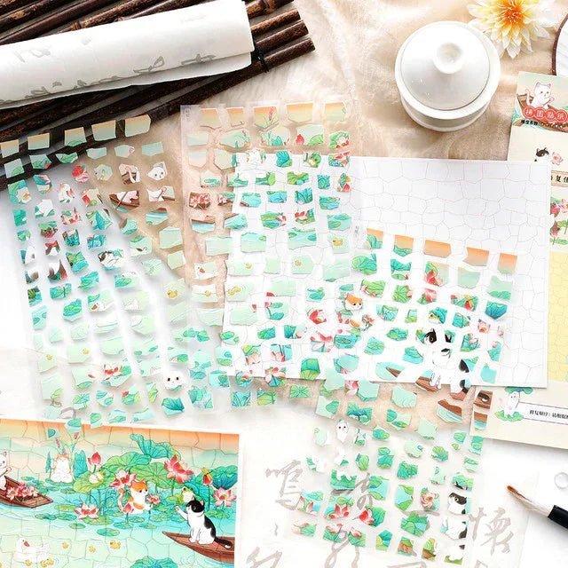 Cute cat and lotus pond scene stickers for journaling or scrapbooking on a light background.