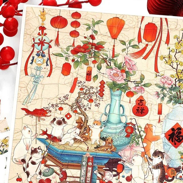 Vintage-style scene sticker with playful cats, red lanterns, cherry blossoms, and festive spring decor.