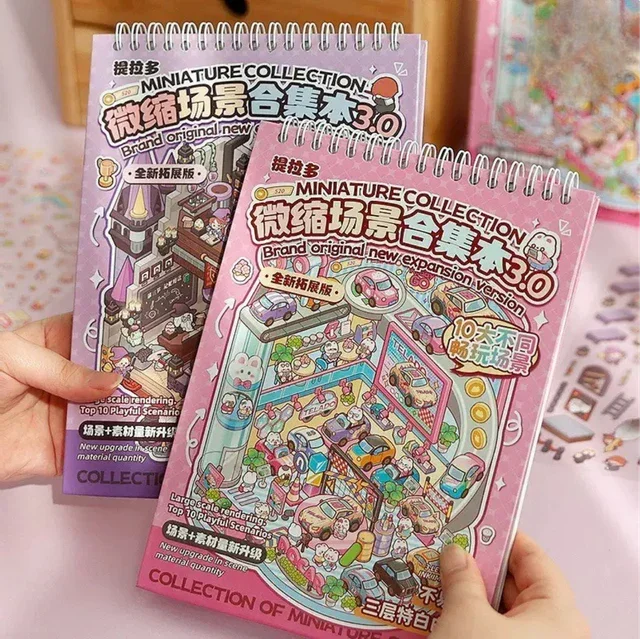 Miniature scene sticker books with cute pink and purple illustrated covers, spiral bound