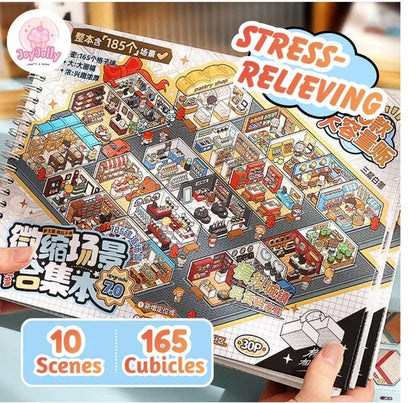 Hand holding a colorful miniature scene sticker book featuring various shop cubicles and rooms.