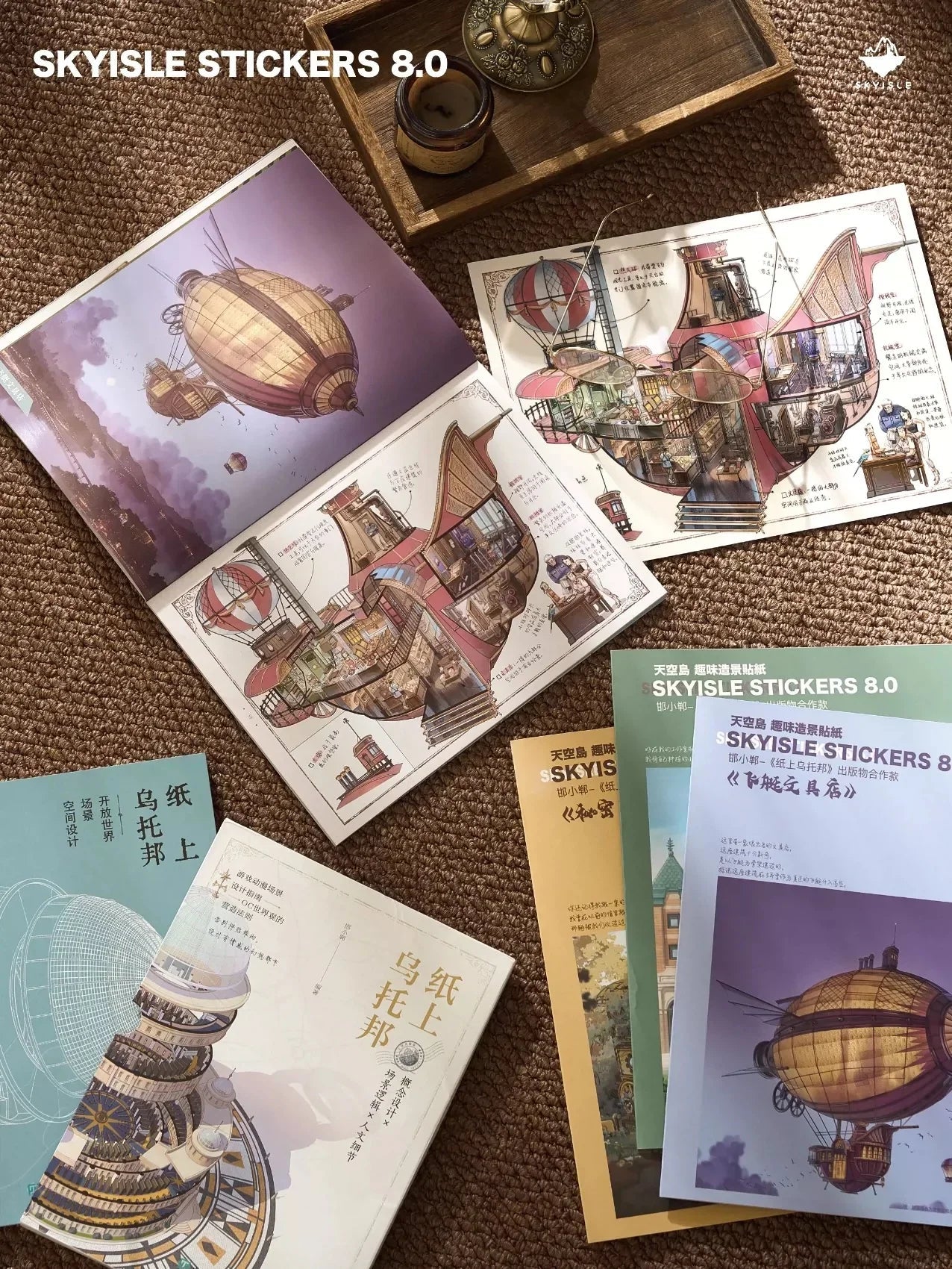 Architect sketch-style airship sticker books and illustrated stationery on carpet